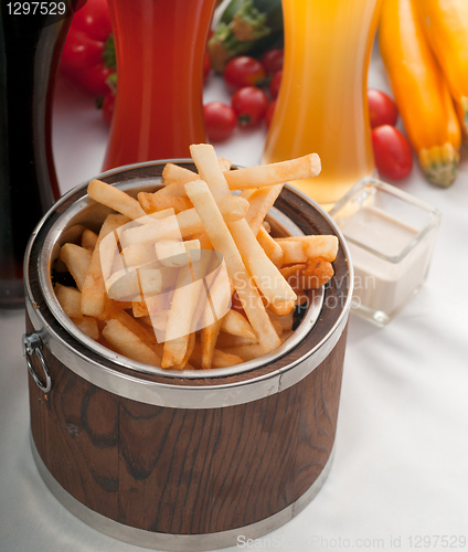 Image of fresh french fries on a bucket