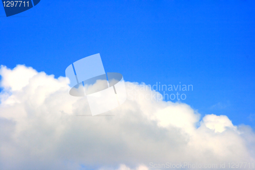 Image of Background with white clouds and blue sky