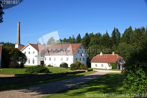 Image of  Houses on a background of trees