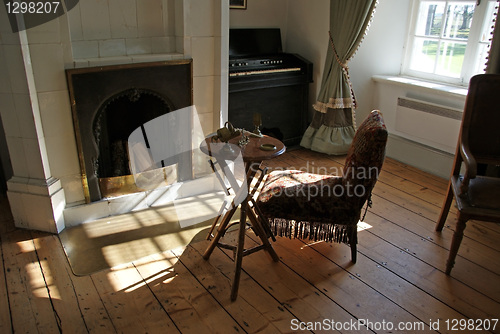 Image of At a fireplace