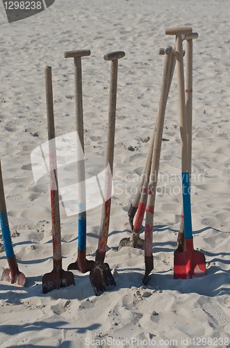 Image of showels in the sand