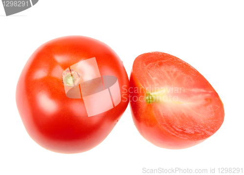 Image of Group of one cross and full ripe red tomatoes