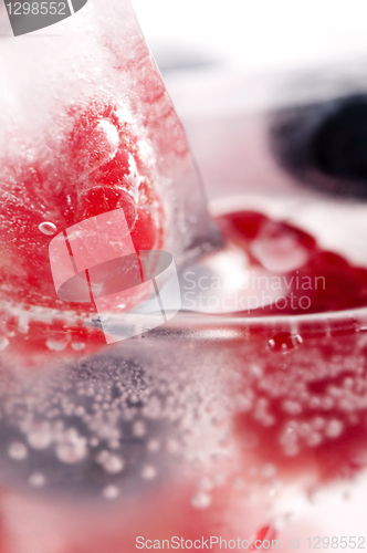 Image of Raspberry and blackberry frozen in ice sticks