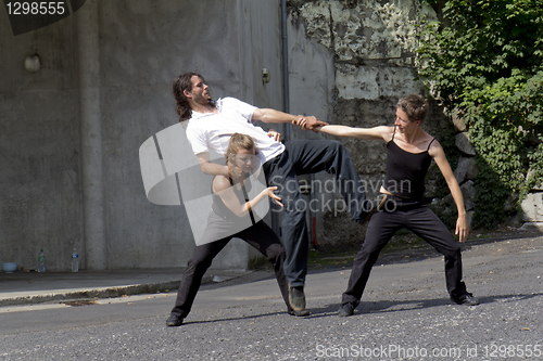 Image of Three dancers in the street