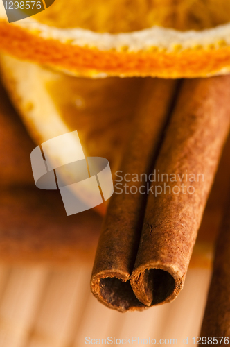 Image of Dried orange and cinnamon sticks - christmas decoration