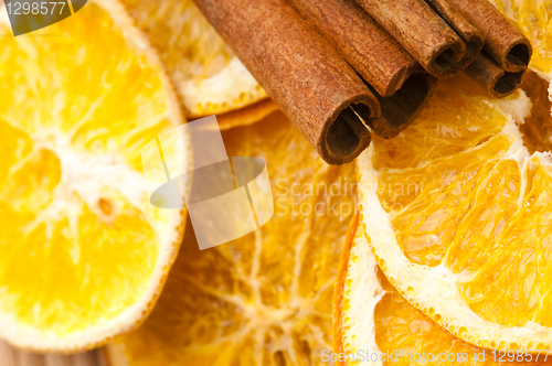 Image of Dried orange and cinnamon sticks - christmas decoration