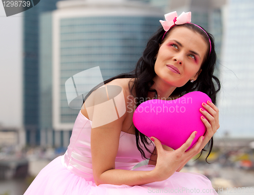 Image of girl doll with heart