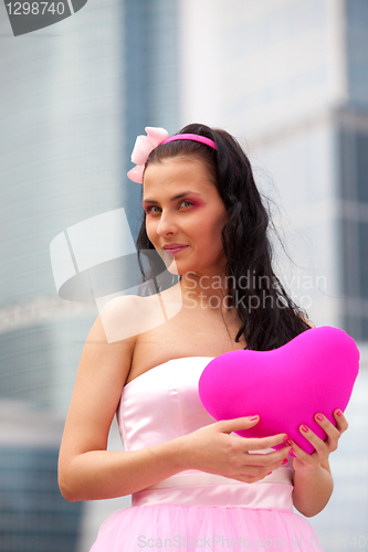 Image of girl doll with heart