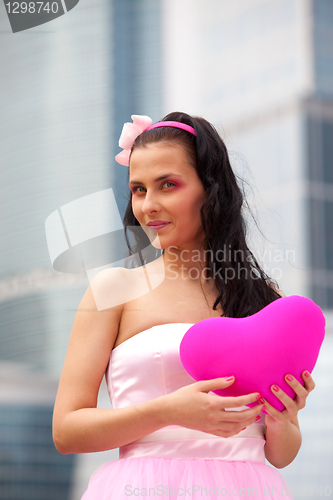 Image of girl doll with heart