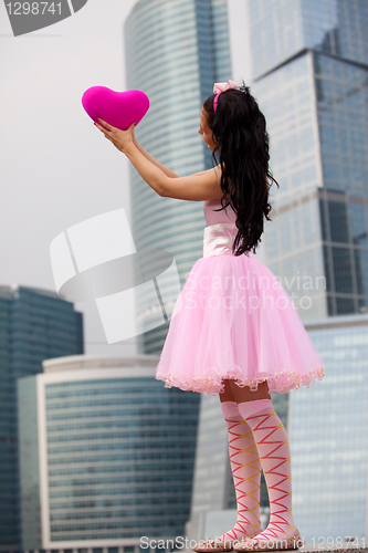Image of girl doll in Big City