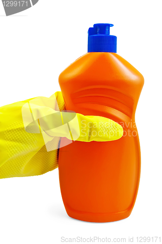 Image of A bottle of orange in yellow-gloved hand in the