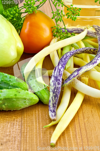 Image of Beans with vegetables on the board