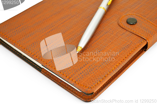 Image of Notebook with pen