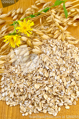 Image of Oat flakes with yellow flowers