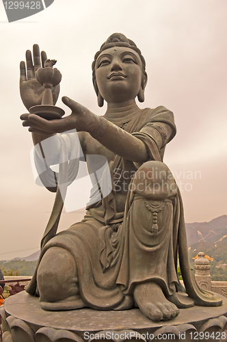 Image of Statue in front of Buddha in Hong Kong 