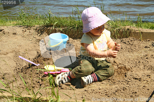 Image of child in sandbox