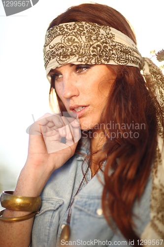Image of Beautiful Woman on a Field in Summertime 