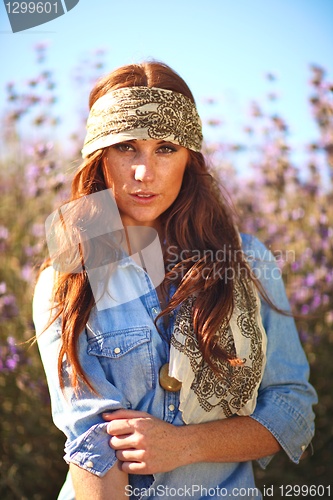 Image of Beautiful Woman on a Field in Summertime 