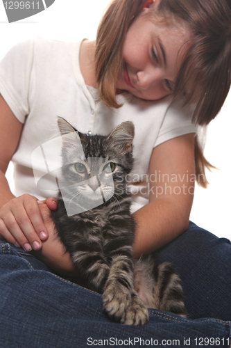 Image of Child Holding a Kitten on White