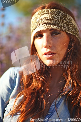 Image of Beautiful Woman on a Field in Summertime 