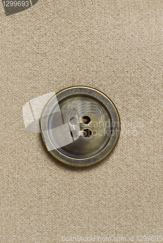 Image of Big button and fabric background