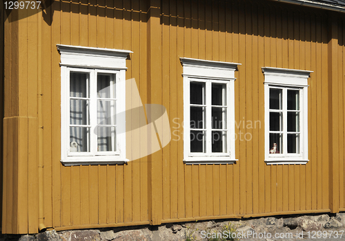 Image of Yellow Wall, White Windows