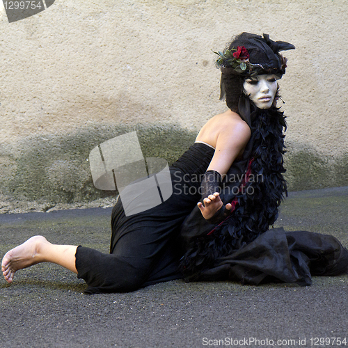 Image of Masked female dancer