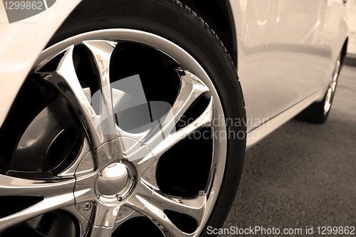 Image of Close up wheel of a spots car