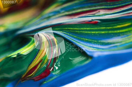 Image of paints on the white paper