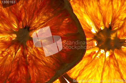 Image of dried orange slices isolated on white background 