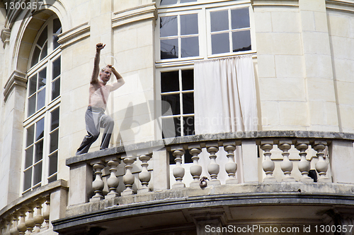 Image of Climber on a balcony