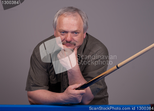 Image of man playing pool