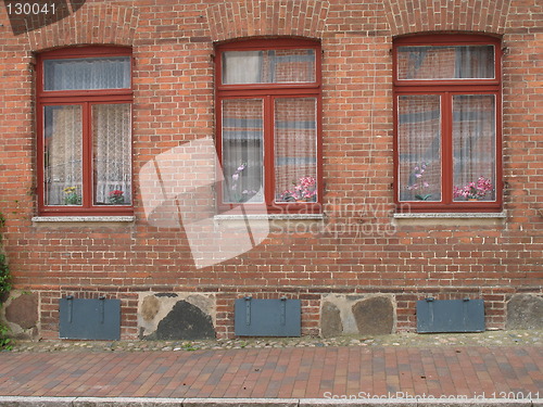 Image of three red windows