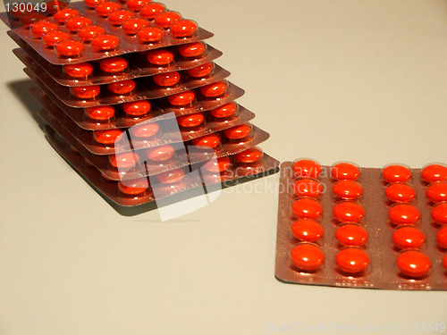 Image of red tablets in packing