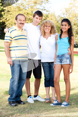 Image of Portrait of a happy family of four