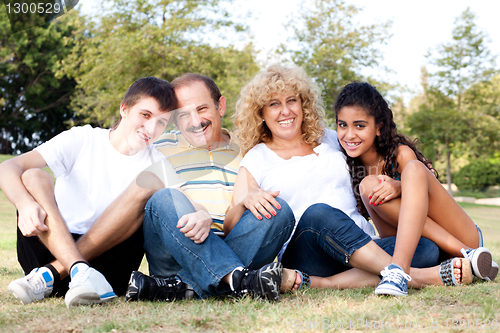 Image of Family having fun in countryside