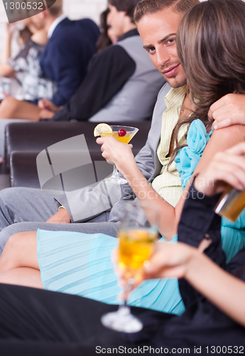 Image of Three couples on a romantic date in the night club