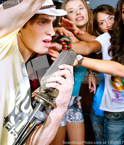 Image of Male lead singer with retro mic