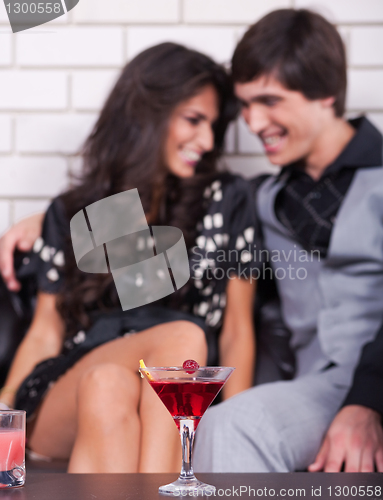 Image of Couple on date in bar or night club