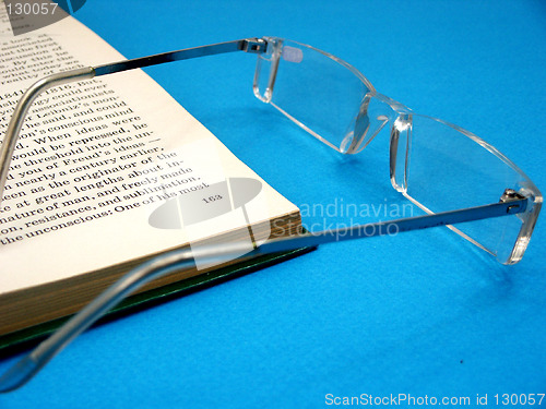 Image of glasses and the book