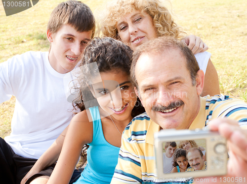 Image of Attractive family pose for a self portrait