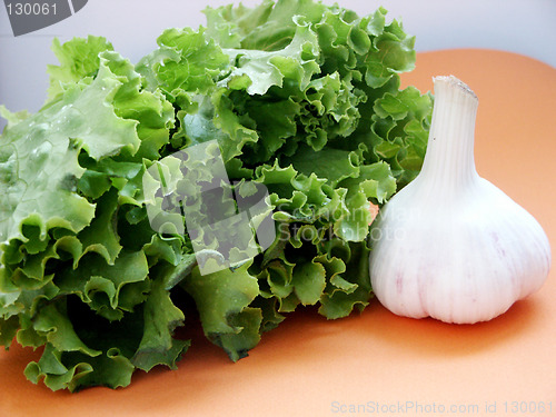 Image of green chinese salad and garlic