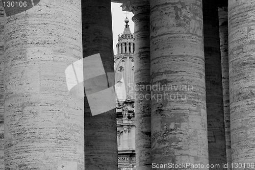 Image of The dome of St. Peter's Cathedral seen through the colonnade