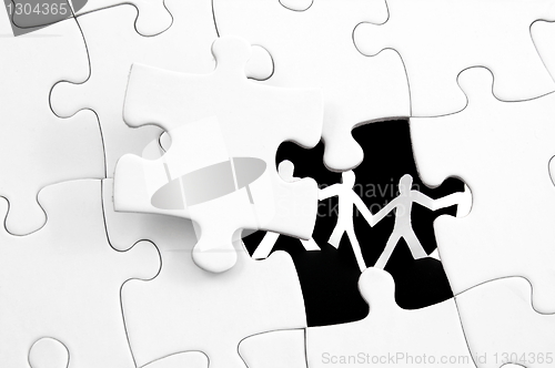 Image of puzzle and teamwork