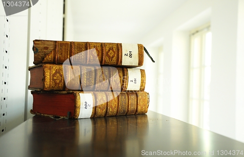 Image of old books in library