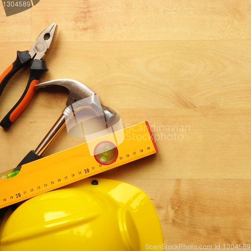 Image of hard hat and tool
