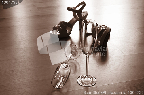 Image of sexy high heel and champagne glass