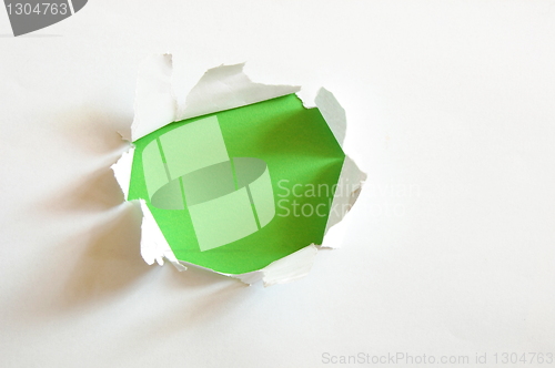 Image of green hole in blank sheet paper