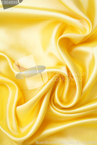 Image of Smooth elegant golden silk as background 