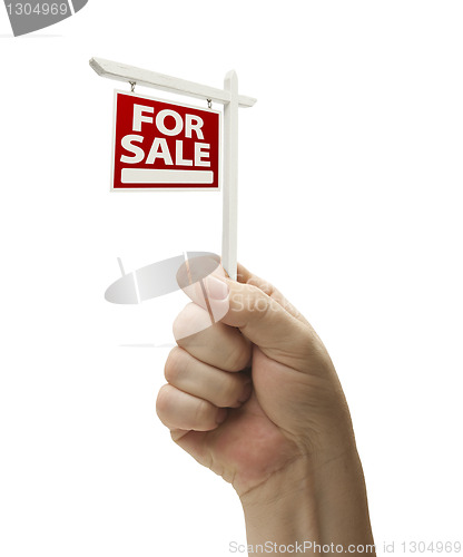 Image of For Sale Real Estate Sign In Fist On White